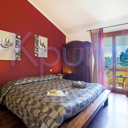 Le Api Hotel Каляри Екстериор снимка