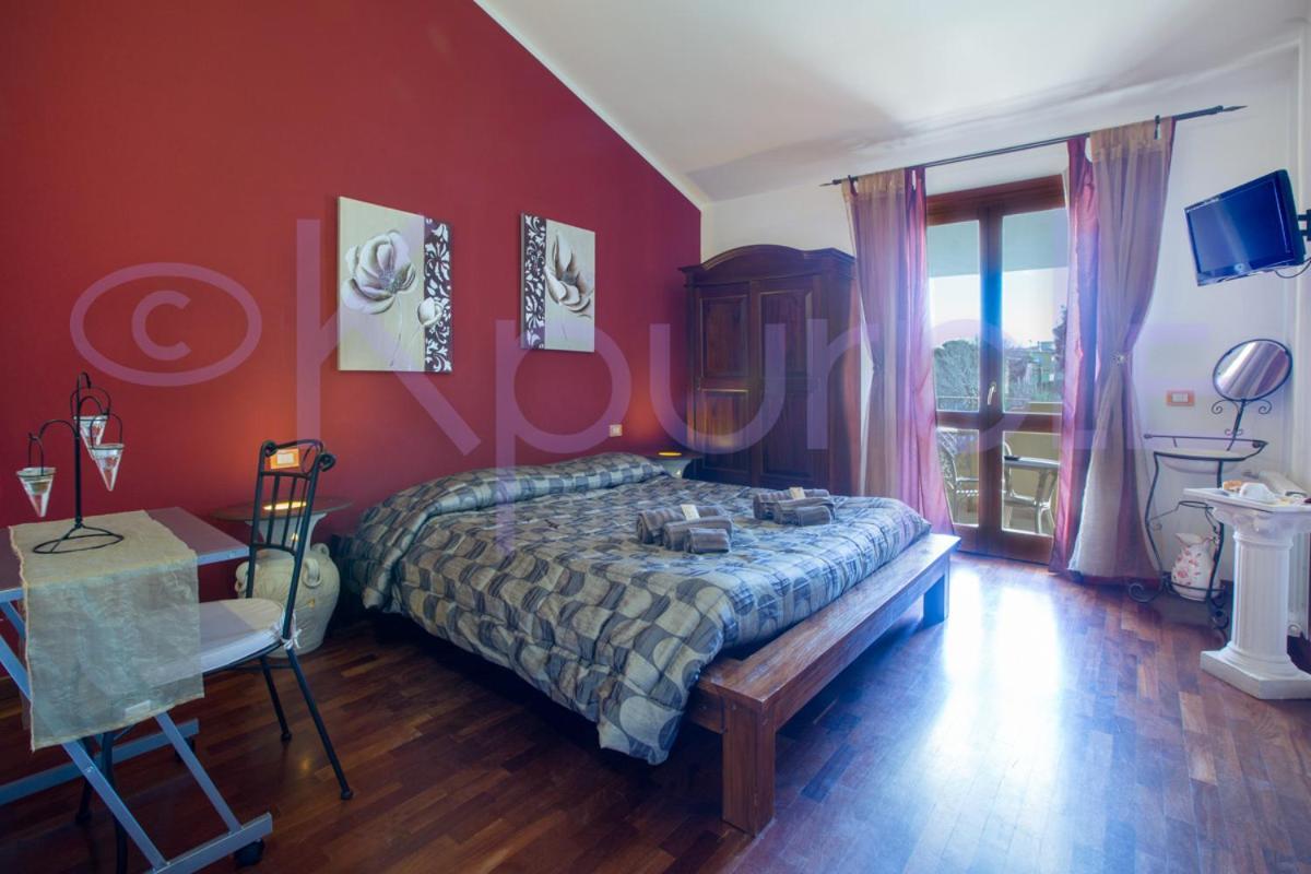 Le Api Hotel Каляри Екстериор снимка