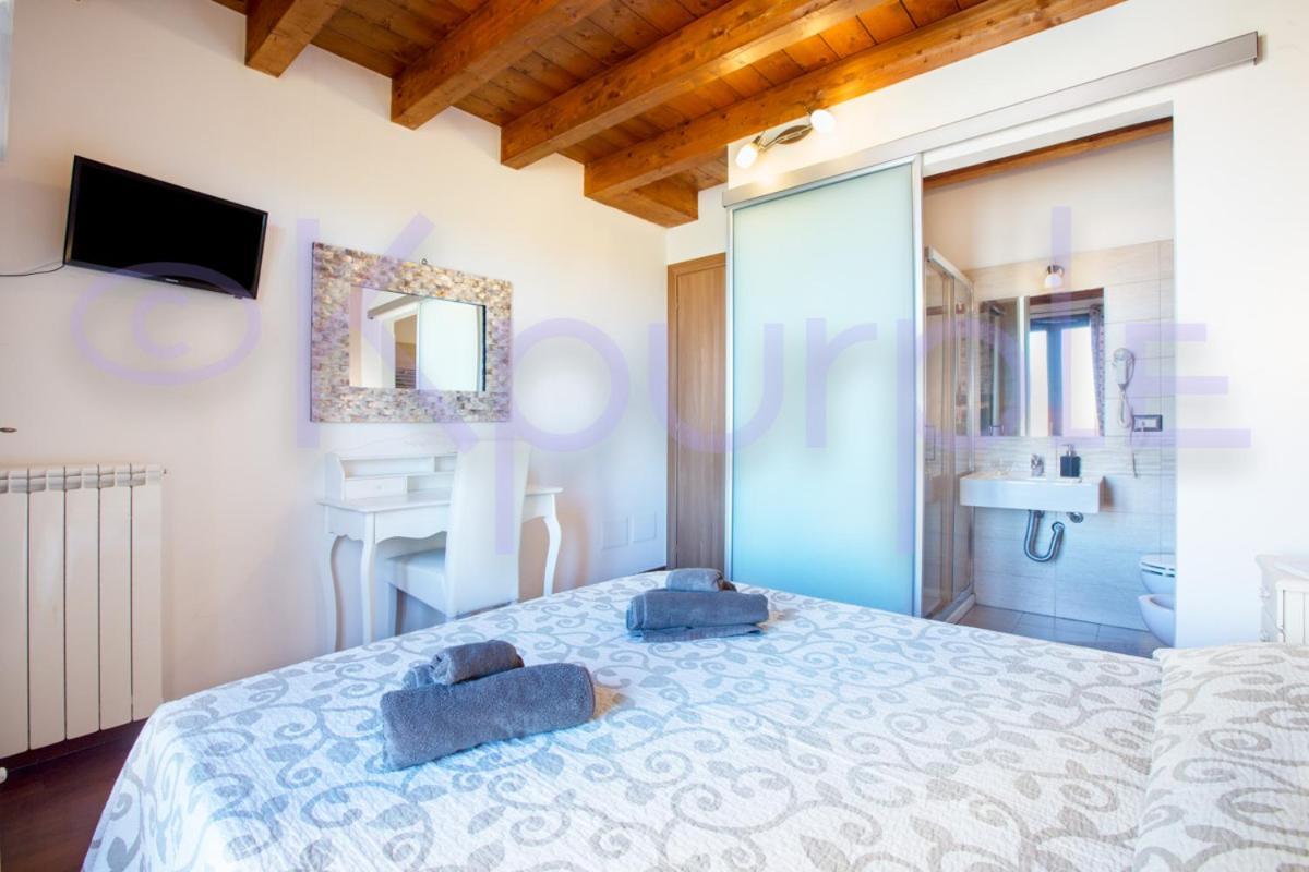Le Api Hotel Каляри Екстериор снимка